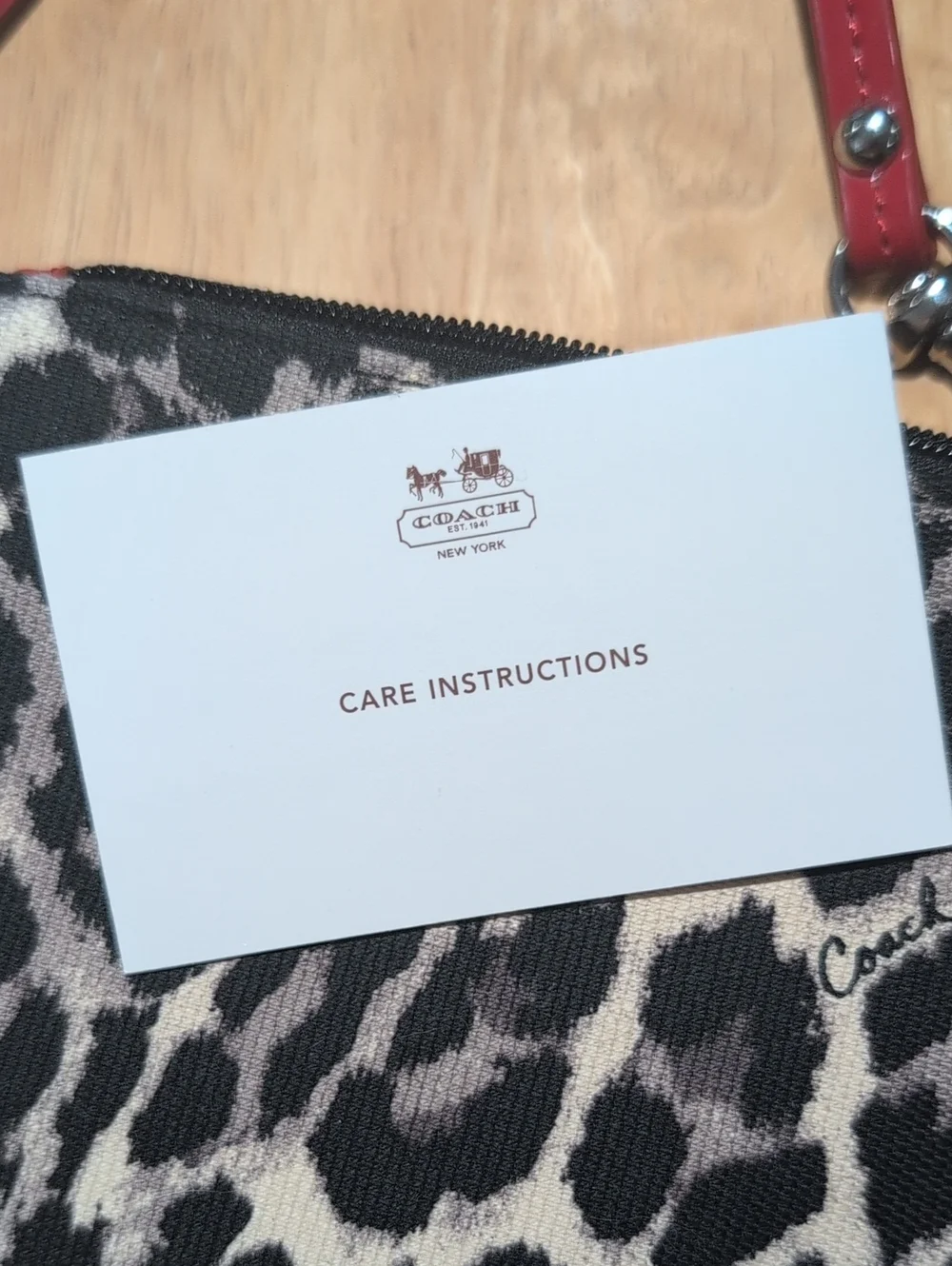 Coach Park Ocelot Wristlet w/Flaw *Please Read